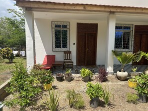 Apartment, 1 Bedroom, Smoking, Garden View | Terrace/patio - Budget Double Room With Kitchen and AC (Paje)