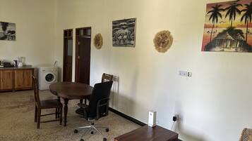 Apartment, 1 Bedroom, Smoking, Garden View | Dining room