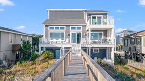 Exterior - Elegant Oceanfront 4 Bedroom 4 Bathroom 14 person home with direct, private beach access and panoramic beach views. (Ocean Isle Beach)