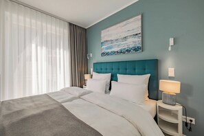 Appartement luxueux | Rideaux d’obscurcissement, fer et planche à repasser