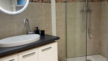 Hair dryer, towels, soap, toilet paper