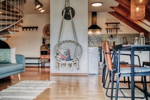 Deluxe Apartment, Balcony, Garden View | Living area - Sohana Lifestyle Apartment Stefan's Home (Rust)