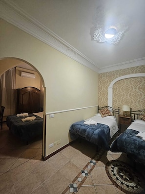 Deluxe Quadruple Room | Egyptian cotton sheets, premium bedding, down duvets, memory-foam beds - Hotel Giubileo (Rome)