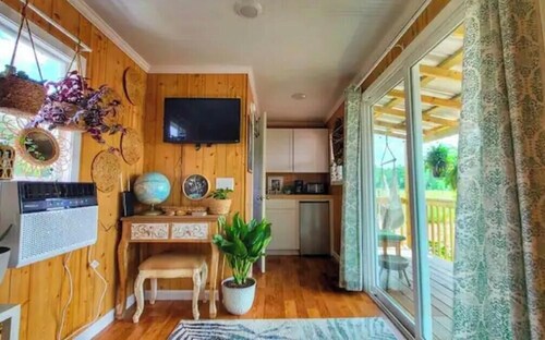 On farm shipping container conversion with heated bathhouse