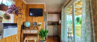 On farm shipping container conversion with heated bathhouse