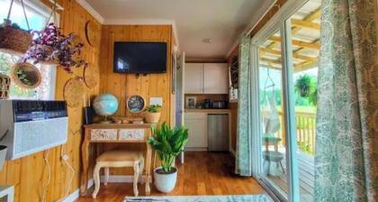 On farm shipping container conversion with heated bathhouse