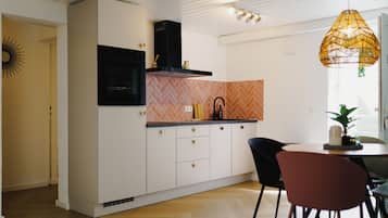 Suite estudio superior, varias camas, alberca privada | Restaurantes