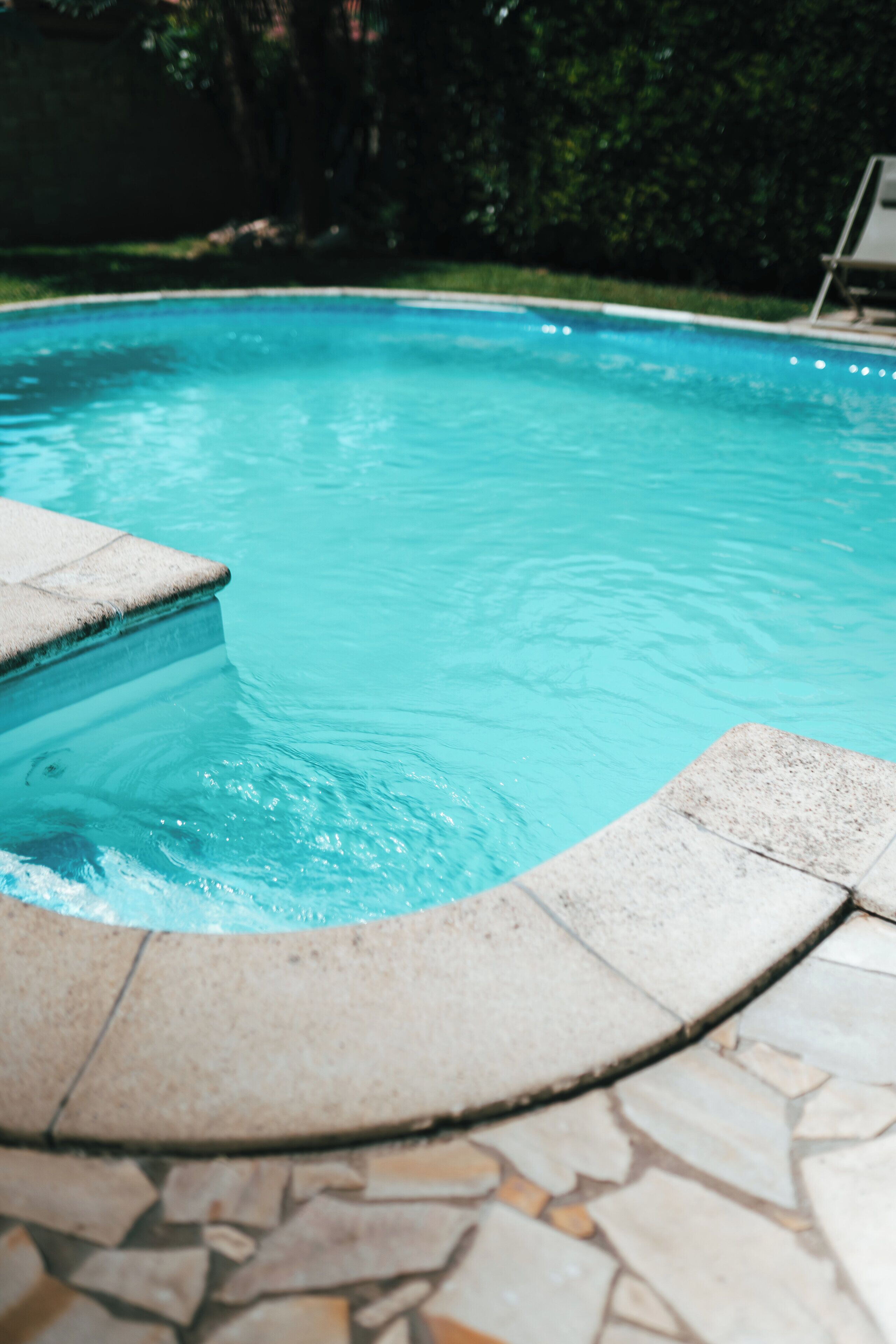 Seasonal outdoor pool, open 5:00 PM to 9:00 PM, pool umbrellas