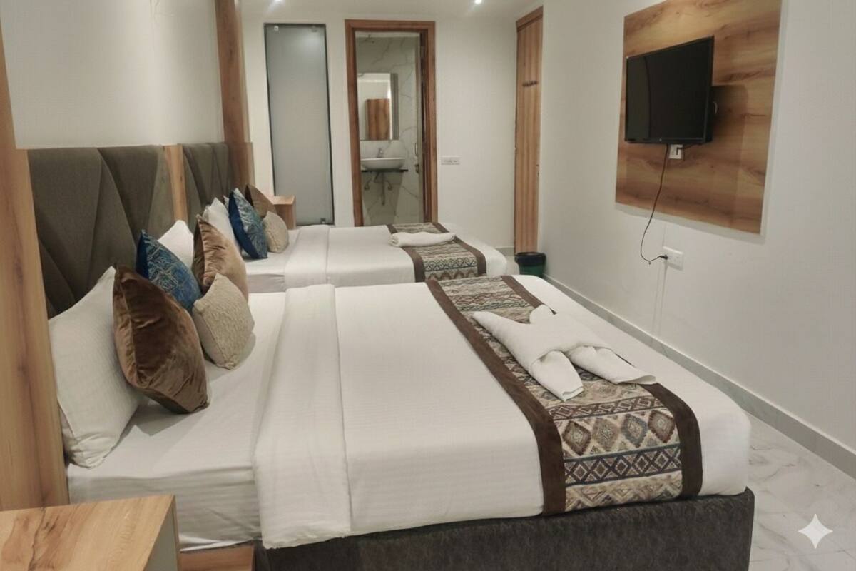 Family Quadruple Room, Garden View | In-room safe, desk, laptop workspace, blackout drapes