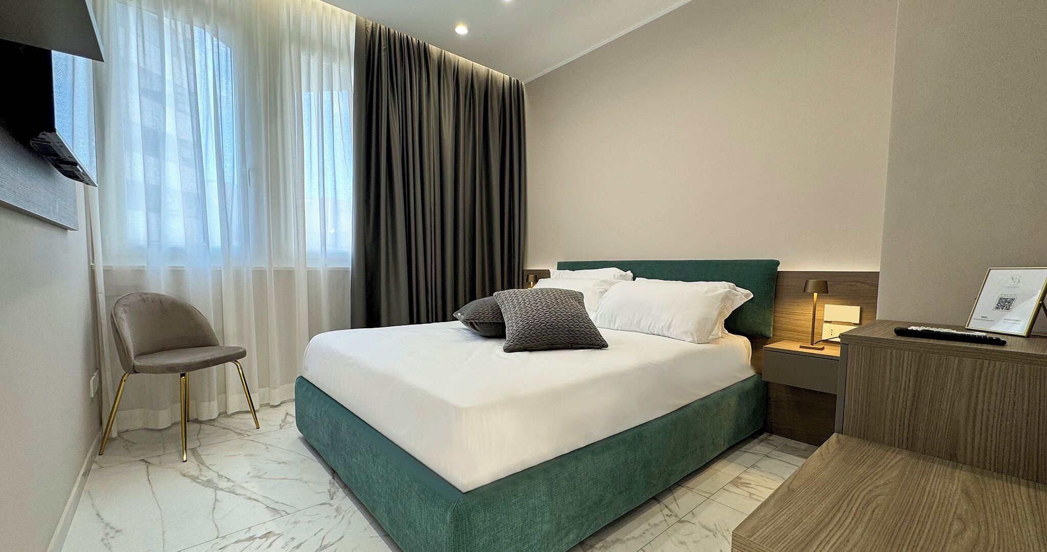 Deluxe Quadruple Room, Private Bathroom | In-room safe, desk, free WiFi