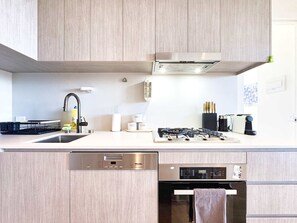 Fridge, microwave, oven, stovetop - Modern CBD Gem - 2BR w/ City Views in Rundle Mall (Adelaide)