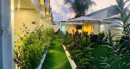 Handhuvaru Maldives Villa offers private AC room, bathrooms, and garden views