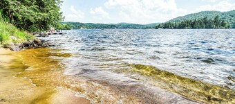 Luxurious property in the Laurentians on the shores of majestic Lac des Sables