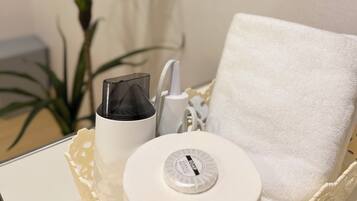 Hair dryer, towels, soap, toilet paper