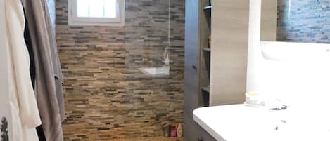 Shower, hair dryer, towels, soap