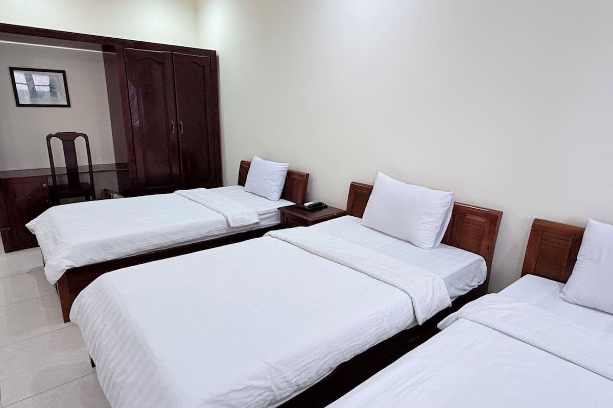 Superior Triple Room, Partial Ocean View | Laptop workspace, free WiFi