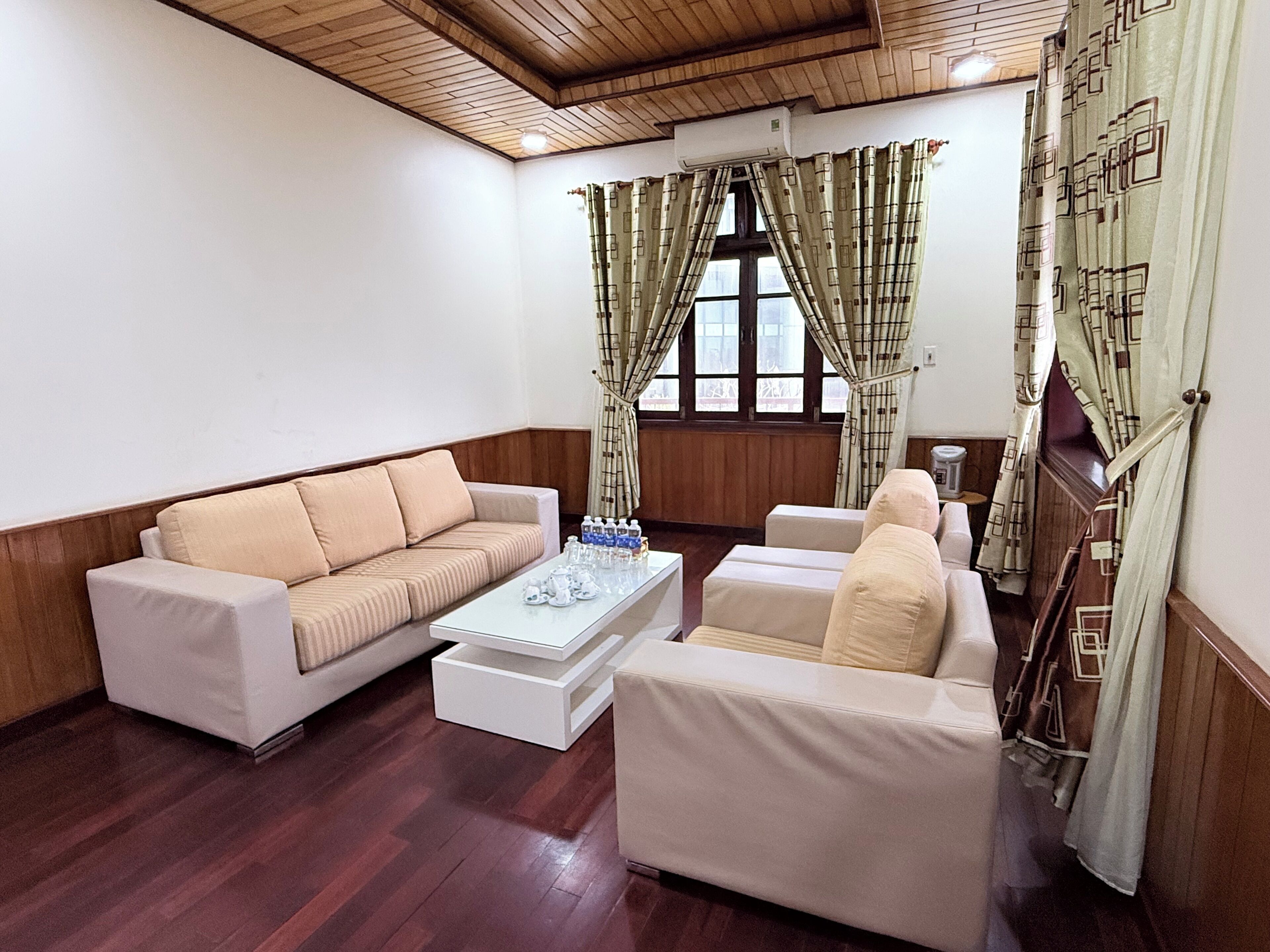 Chambre Double Deluxe, vue plage | Coin séjour