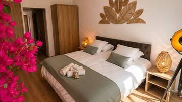 Deluxe Apartment, City View | Premium bedding, blackout curtains, free WiFi, bed sheets