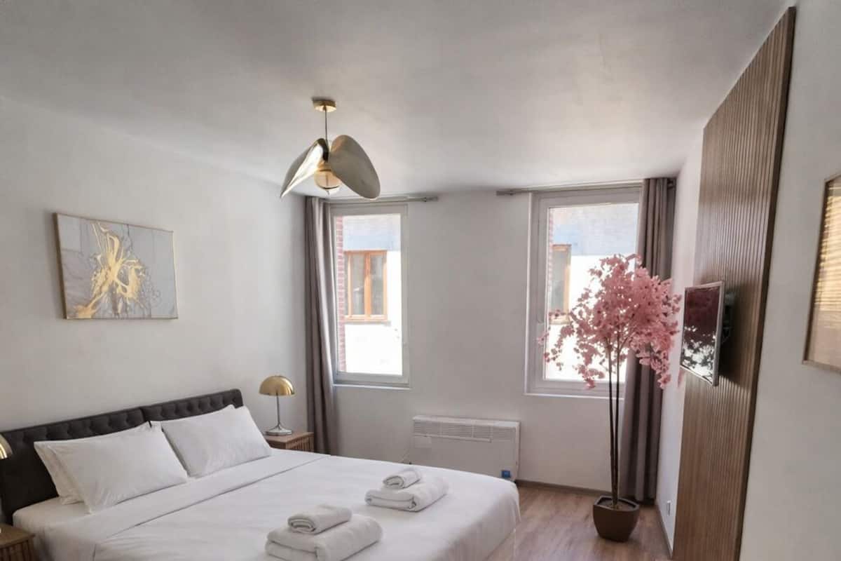 Departamento Deluxe, vista a la ciudad | Ropa de cama de alta calidad, cortinas blackout y wifi gratis