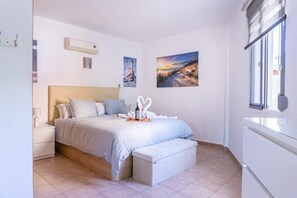 1 chambre, coffres-forts dans les chambres, fer et planche à repasser