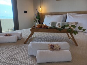 Iron/ironing board, free WiFi, bed sheets - Renovated seaside apt for couples: sea view, full kitchen & Wi-Fi. (Kato Gouves)