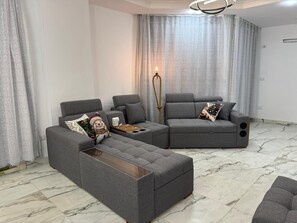 Living area - RoyalApartment inExtension ofAmerican University (New Cairo)