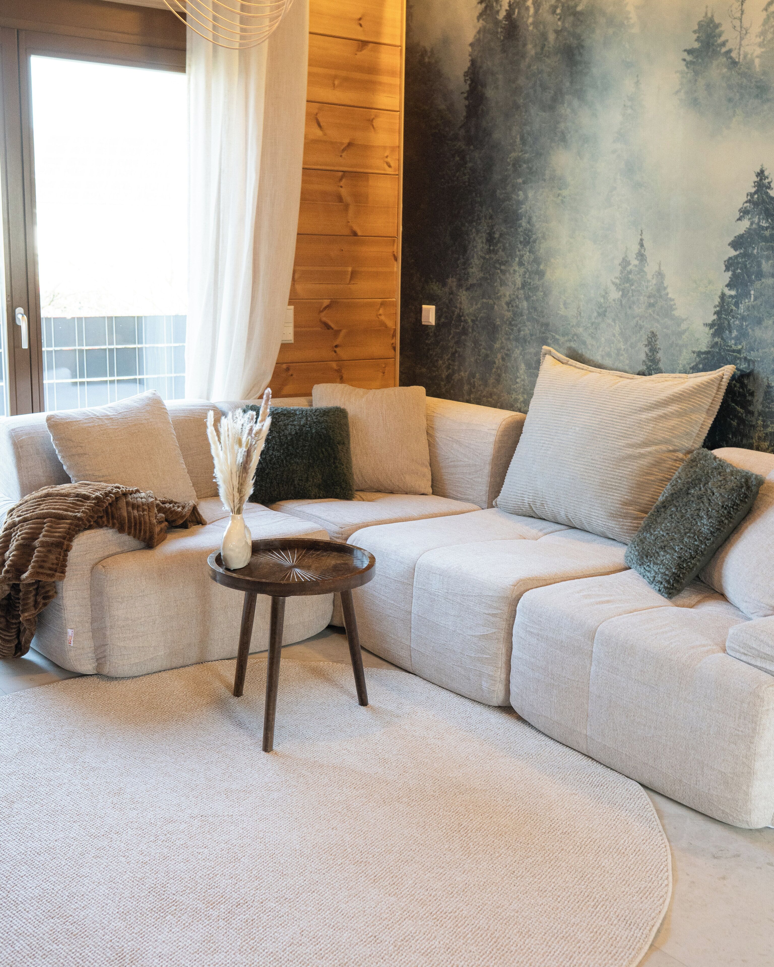 Departamento superior, vista al jardín | Área de sala de estar