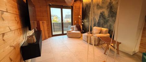 Superior Apartment, Garden View | Living area | TV