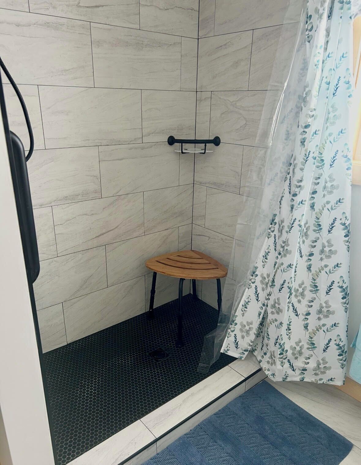 Shower, hair dryer, towels, toilet paper