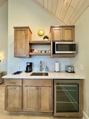 Fridge, microwave, coffee/tea maker, toaster