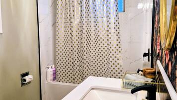 Hair dryer, towels, soap, toilet paper