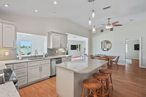 Fridge, microwave, oven, stovetop - NEW! Waterfront 4 bedroom home, Heated Pool, Private Dock, Kayaks, Walk to beach (Indian Rocks Beach)