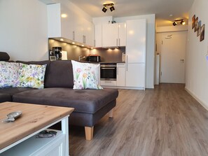 TV, fireplace - Komfortable Ferienwohnung in Ostseebad Damp mit Großer Terrasse by Interhome (Damp)