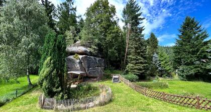 Waldferienhaus Dunja mit Sauna, Whirlpool, direkt am Waldrand, Kletterfelsen by Interhome