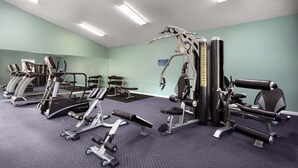 A gym with treadmills, weight machines, and free weights. - Magnolia Pointe Magnolia Lake 4817-204 (Myrtle Beach)