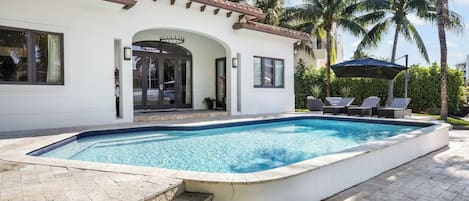 Outdoor pool, pool umbrellas, pool loungers