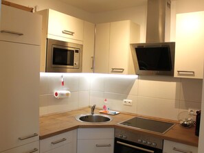 Fridge, microwave, oven, dishwasher - Gesamte Wohnung in Scharbeutz mit Großem Garten by Interhome (Haffkrug)
