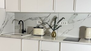 Fridge, microwave, cookware/dishes/utensils
