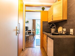 Fridge, microwave, cookware/dishes/utensils