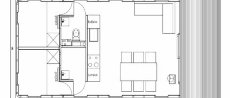 Een plattegrond van een hotelkamer met een kitchenette, een badkamer en een eethoek.