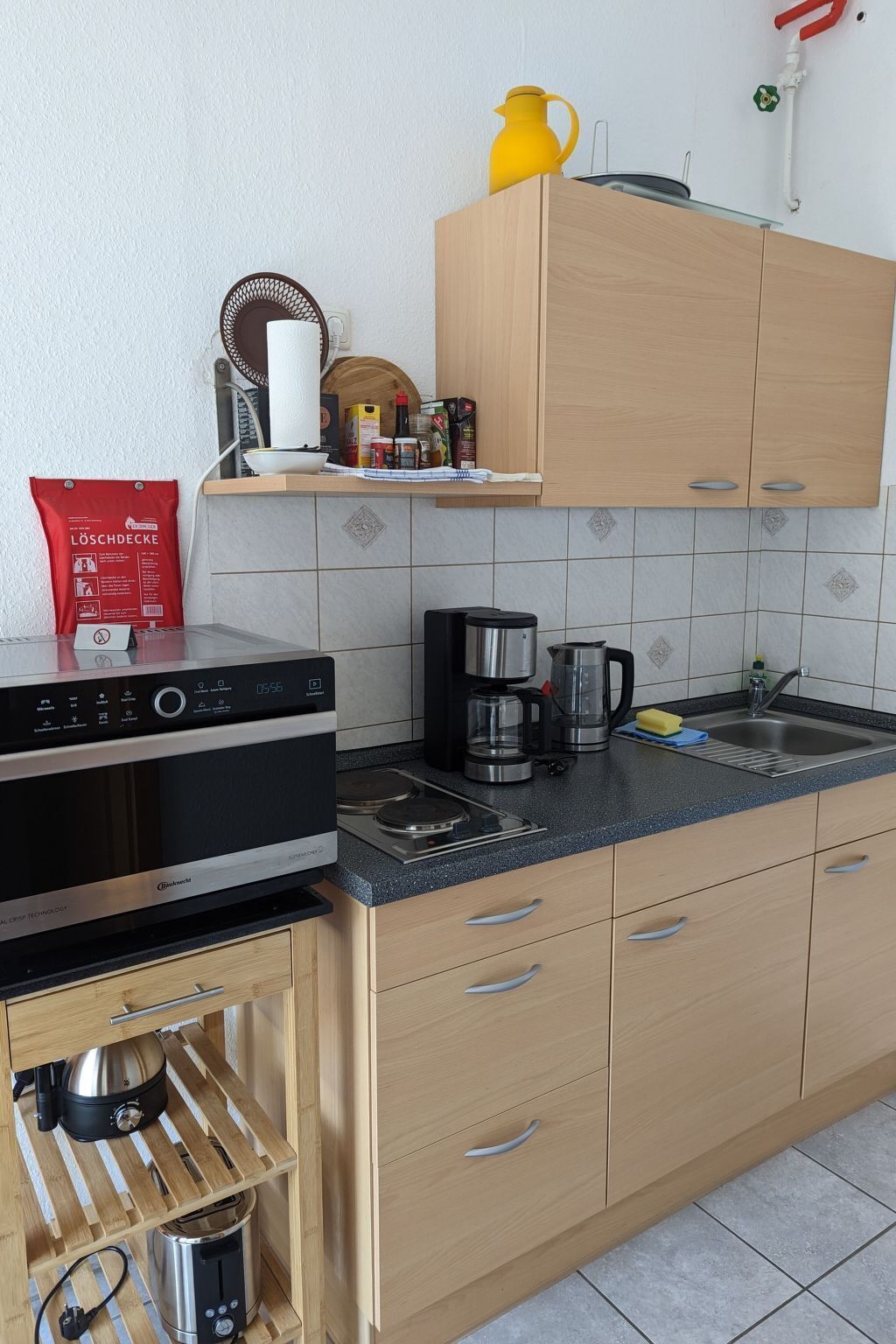 Fridge, microwave, oven, cookware/dishes/utensils