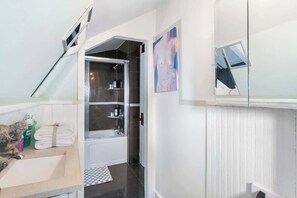 Shower, hair dryer - The City Climb | Cozy Attic Apartment Near NYC (North Bergen)
