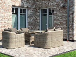 Outdoor dining - Merzijana Eerdgeschoss in Stinteck by Interhome (Büsum)