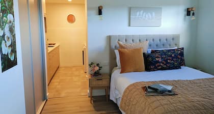 Cosy 1 Bedroom Unit with separate living space, laundry and kitchen.