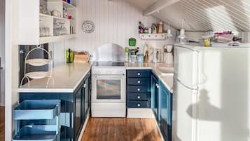 Fridge, stovetop, coffee/tea maker, cookware/dishes/utensils