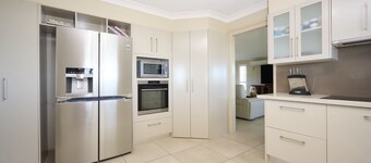 Family Coastal Retreat with Pool and Balcony Views