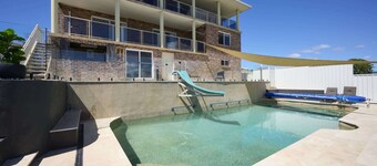 Family Coastal Retreat with Pool and Balcony Views