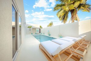 Outdoor pool - Soulful Escape – Spacious 5BR Villa by Bocobay (Noord)