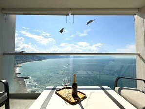 Outdoor dining - Oceanview 1BR w/ Breakfast | Rooftop Pool & Gym (Puerto Vallarta)