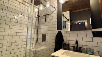 Shower, hair dryer, towels, soap